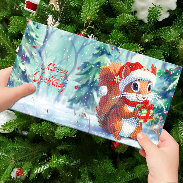 Diamond Painting kerstkaart met eekhoorn in rode muts tussen sneeuw